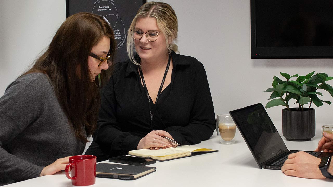 FreshGround employees drinking coffee