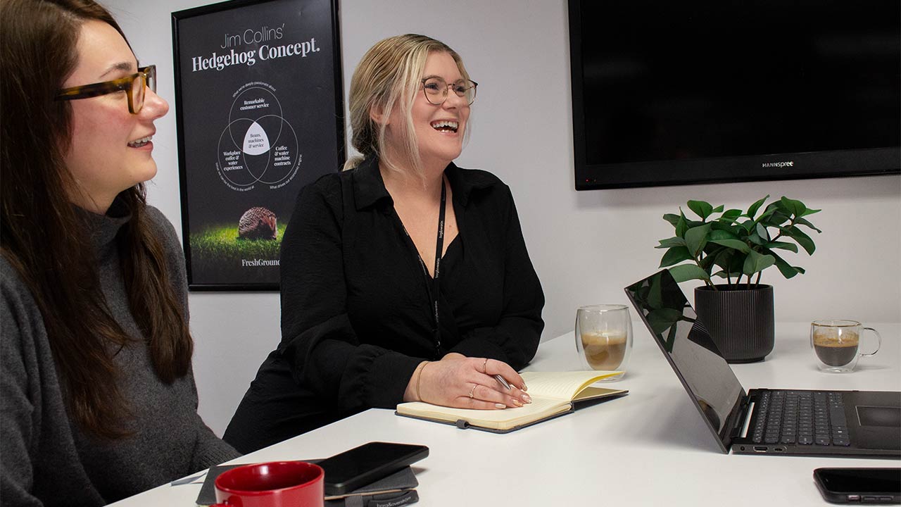 Two happy FreshGround employees