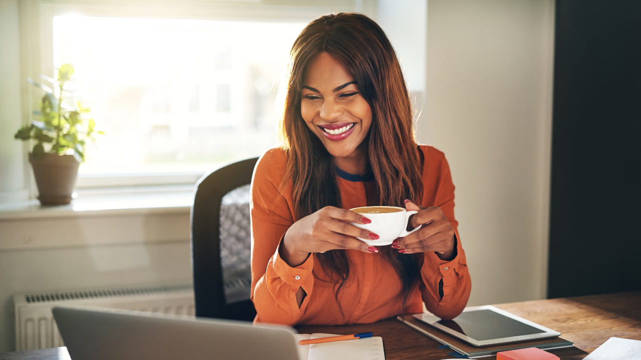 woman holding coffee